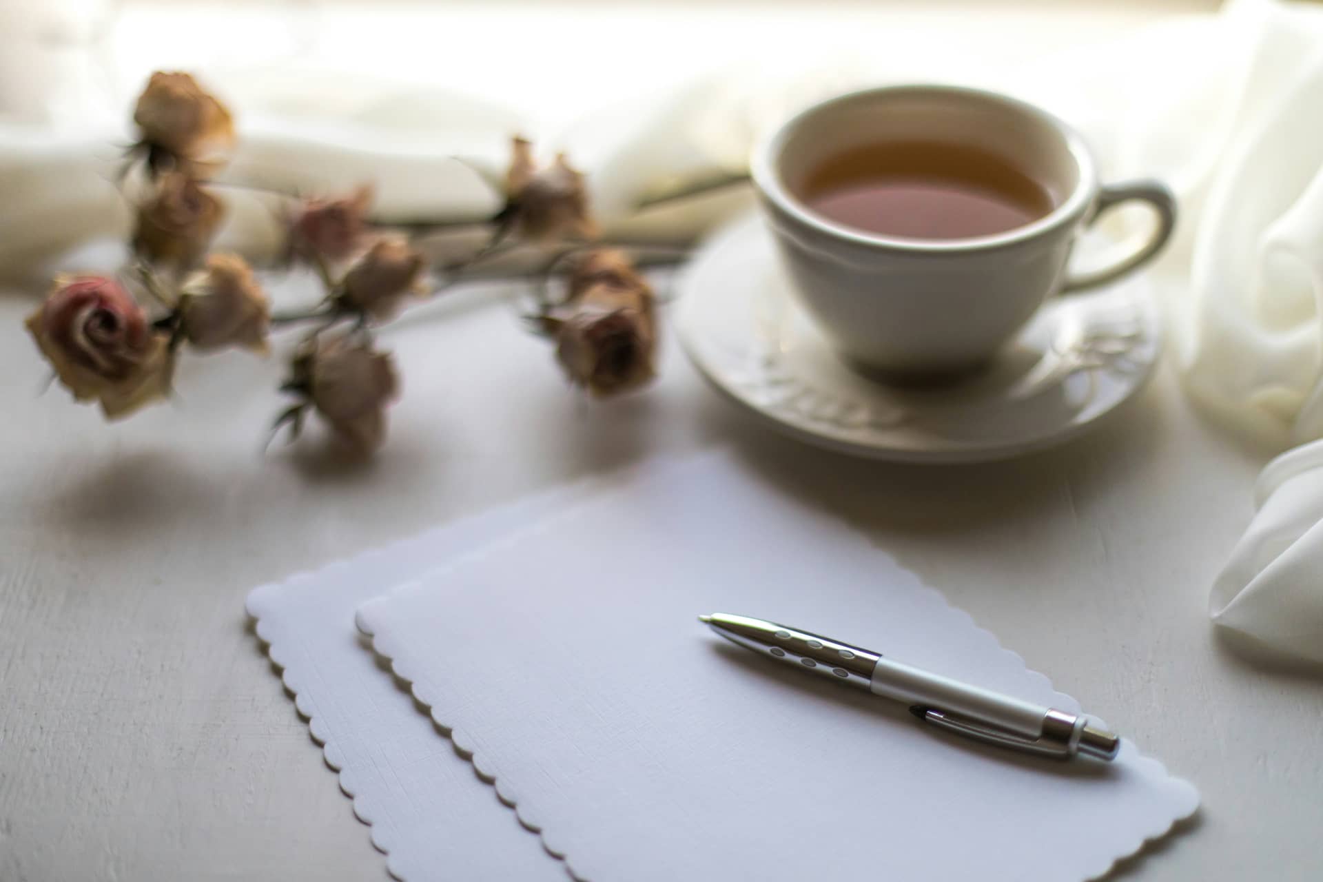 Person writing thoughtfully
